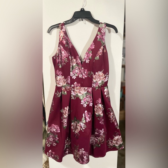 Crystal Doll Dresses & Skirts - Juniors dress. About one inch wide straps, deep V neck line, and Aline shape.